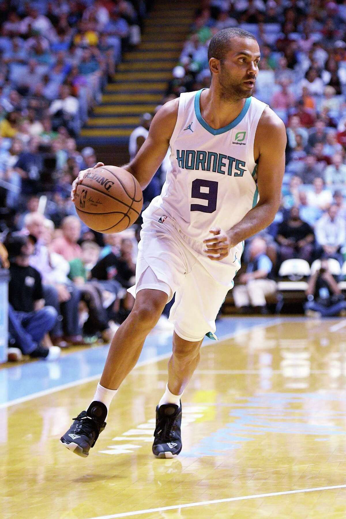 CHAPEL HILL, NC - SEPTEMBER 28: Tony Parker #9 of the Charlotte Hornets moves the ball against the Boston Celtics in the first quarter of a preseason game at Dean Smith Center on September 28, 2018 in Chapel Hill, North Carolina. NOTE TO USER: User expressly acknowledges and agrees that, by downloading and or using this photograph, User is consenting to the terms and conditions of the Getty Images License Agreement. The Hornets won 104-97. (Photo by Lance King/Getty Images)