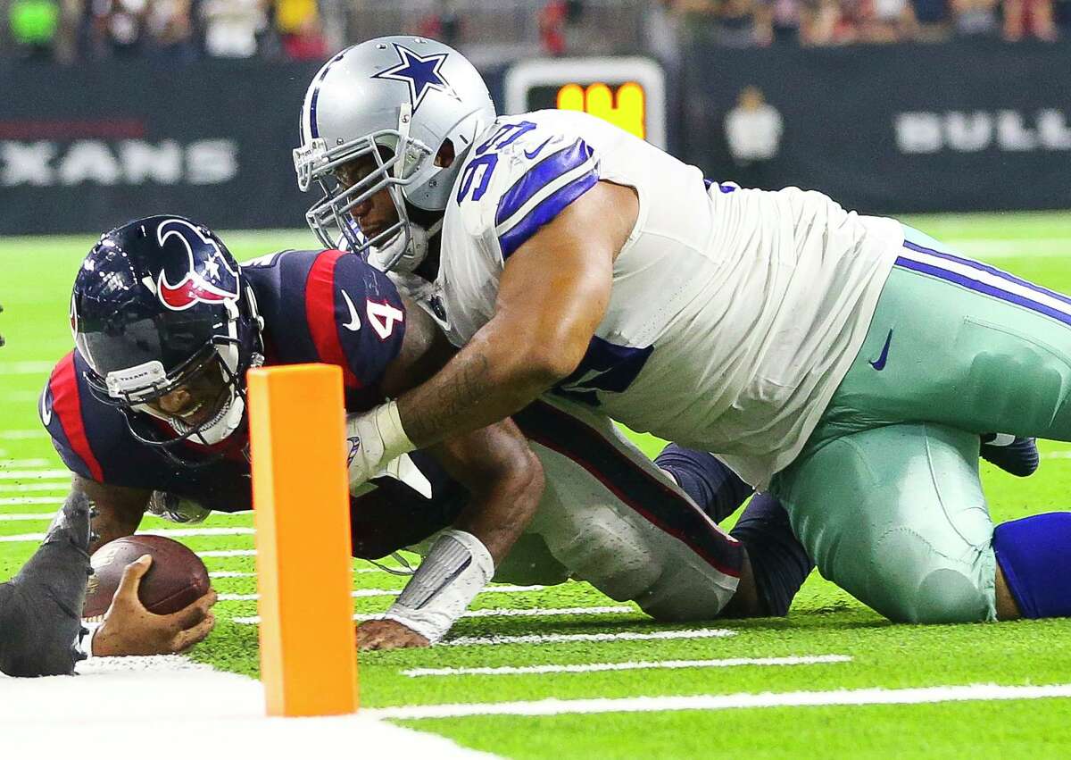 Cowboys' offense moves ball well 'between the 20s.' So what's with the red  zone issues?