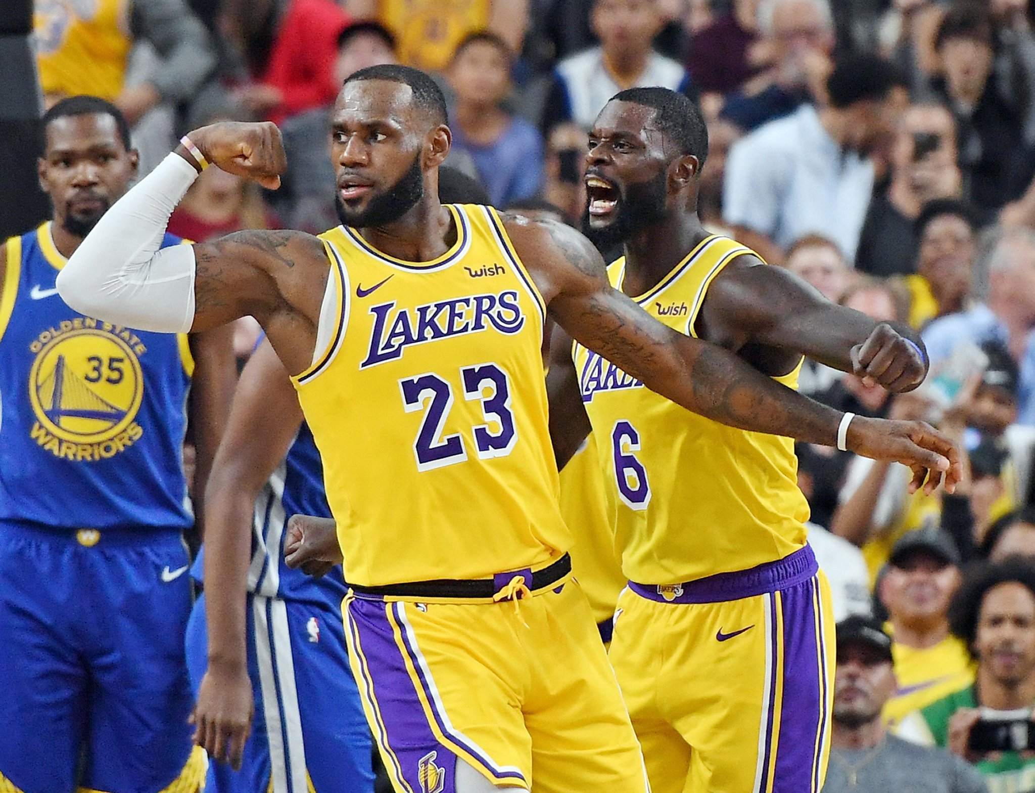 In first game against LeBron James' Lakers, Warriors look ...