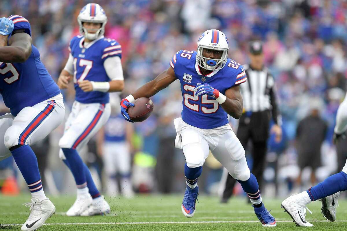 Buffalo Bills running back LeSean McCoy (25) runs with the ball during the first half of an NFL football game against the Tennessee Titans, Sunday, Oct. 7, 2018, in Orchard Park, N.Y. (AP Photo/Adrian Kraus)