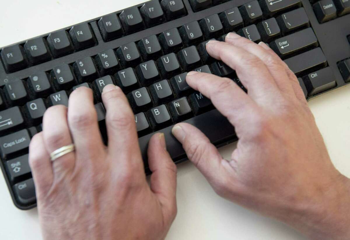(FILES) In this file photo taken on November 21, 2016 a man types on a computer keyboard in this photo illustration taken in Washington, DC. - An elite group of North Korean hackers has been identified as the source of a wave of cyberattacks on global banks that has netted "hundreds of millions" of dollars, security researchers said on October 3, 2018. A report by the cybersecurity firm FireEye said the newly identified group dubbed APT38 is distinct from but linked to other North Korean hacking operations, and has the mission of raising funds for the isolated Pyongyang regime. (Photo by SAUL LOEB / AFP)SAUL LOEB/AFP/Getty Images