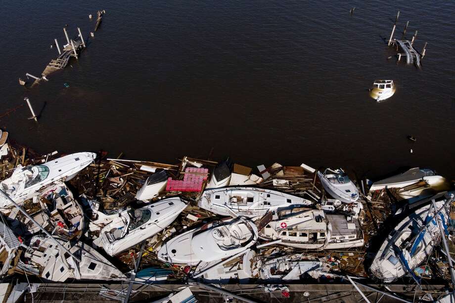 In this aerial view, storm damaged boats are seen in the aftermath of Hurricane Michael on October 11, 2018 in Panama City, Florida. - Residents of the Florida Panhandle woke to scenes of devastation Thursday after Michael tore a path through the coastal region as a powerful hurricane that killed at least two people. Photo: BRENDAN SMIALOWSKI/AFP/Getty Images