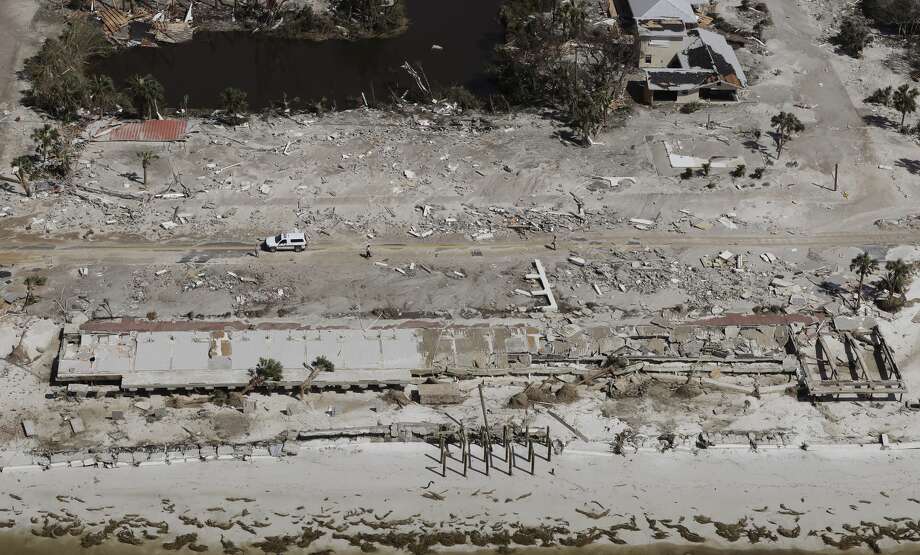 Homes washed away by Hurricane Michael are shown in this aerial photo Thursday, Oct. 11, 2018, in Mexico Beach, Fla. Michael made landfall Wednesday as a Category 4 hurricane with 155 mph (250 kph) winds and a storm surge of 9 feet (2.7 meters). (AP Photo/Chris O'Meara) Photo: Chris O'Meara/AP