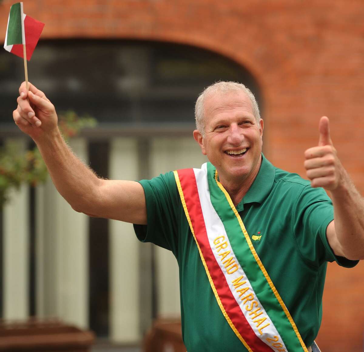 Shelton Mayor Mark Lauretti marches in the 110th Annual Columbus Day Parade on Howe Avenue in Shelton, Conn. on Sunday, Oct. 7, 2018.