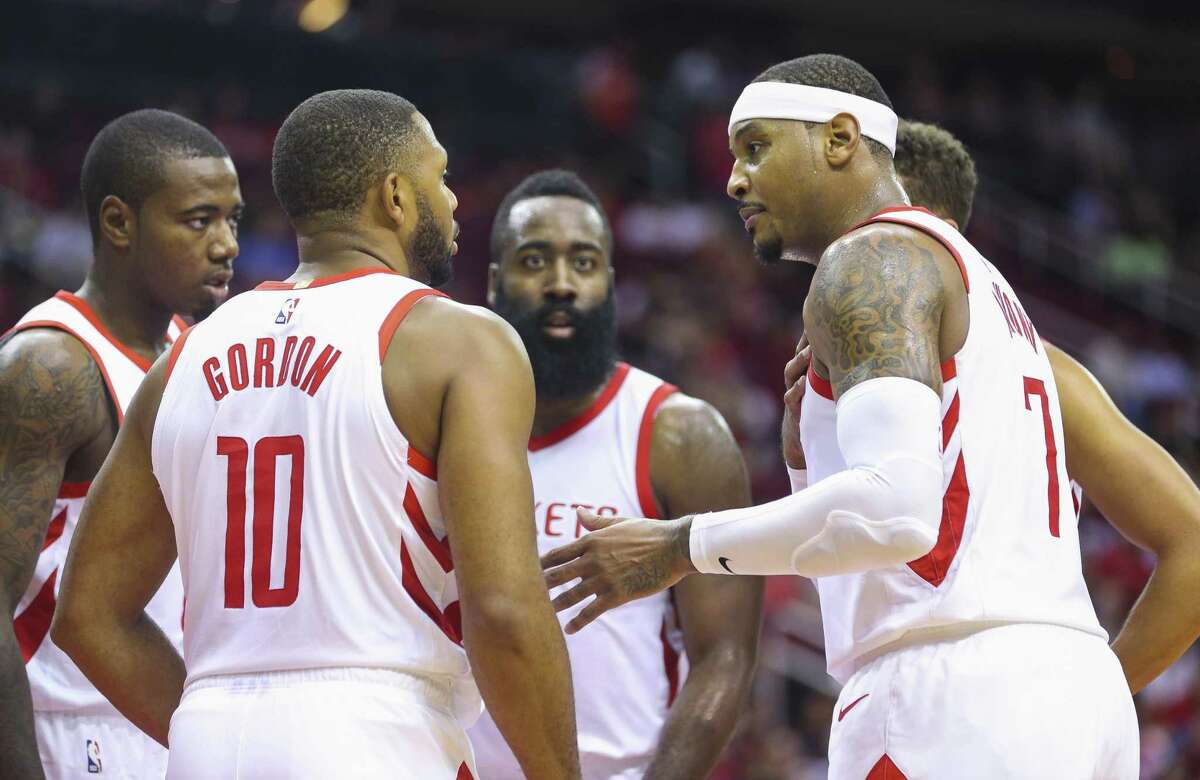Veteran forward Carmelo Anthony, right, gives the Rockets another proven scorer to complement James Harden, center, in their quest for a championship.