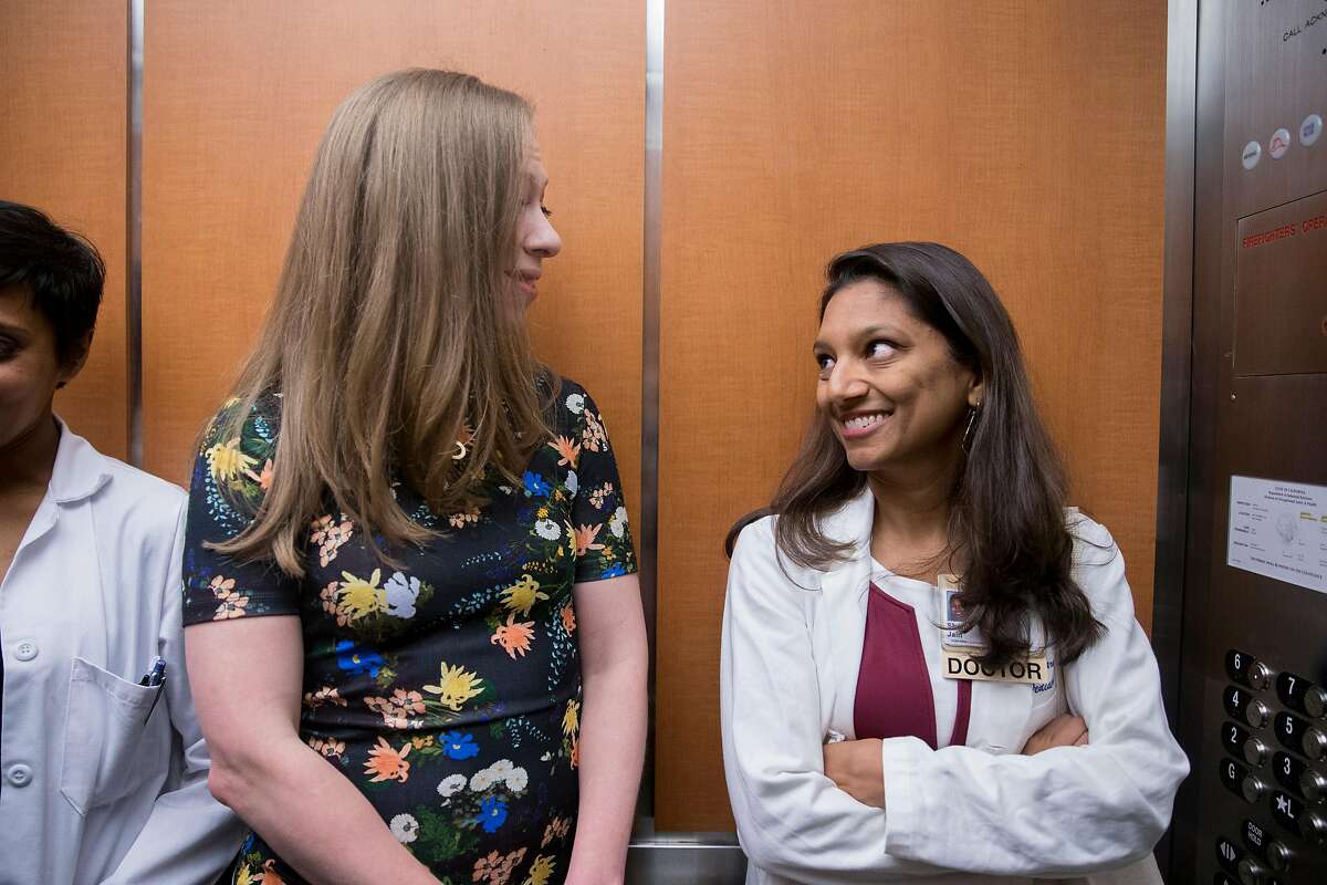 Chelsea Clinton, left, chats with Pediatric Physician Shonul Jain during a tour of the birth center and children's health clinic at Zuckerberg San Francisco General Hospital in San Francisco, Calif. Thursday, Oct. 11, 2018.