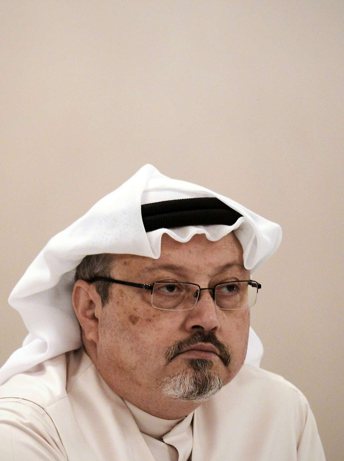 In this file photo taken on December 15, 2014, general manager of Alarab TV, Jamal Khashoggi, looks on during a press conference in the Bahraini capital Manama. - The veteran Saudi journalist who has been critical of the government has gone missing after visiting the kingdom's consulate in Istanbul on September 2, 2018, the Washington Post reported. Khashoggi, a former government advisor who went into self-imposed exile in the United States last year to avoid possible arrest, has been critical of some of the policies of Saudi Crown Prince Mohammed bin Salman and Riyadh's intervention in the war in Yemen. (Photo by MOHAMMED AL-SHAIKH / AFP)MOHAMMED AL-SHAIKH/AFP/Getty Images