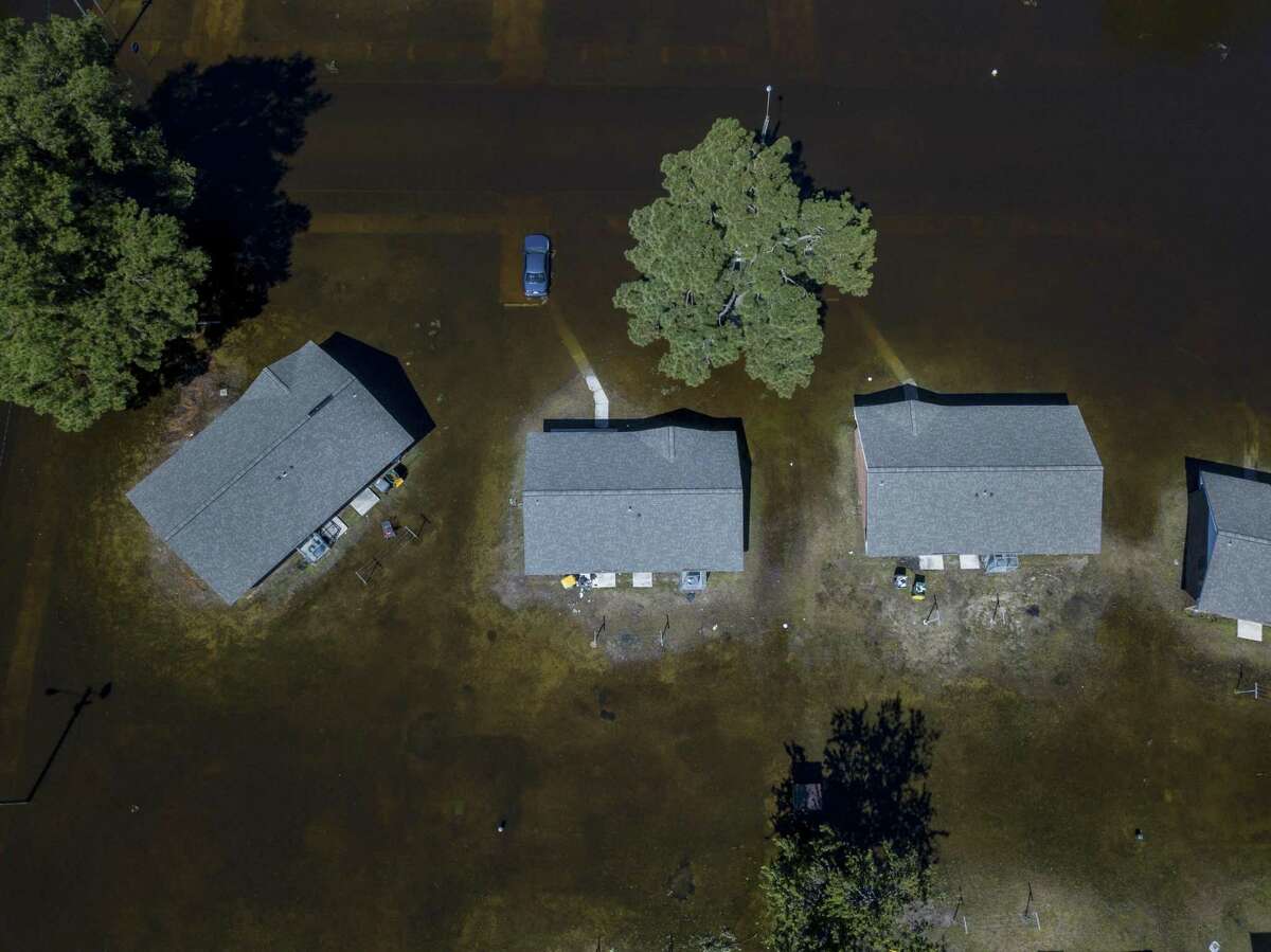 Flooded homes following Hurricane Florence in Lumberton, N.C., Sept. 18. A day after the U.N. issued a call to arms for the world to confront climate change, President Trump, who has mocked the science around it, did not broach the topic, even in vulnerable Florida.
