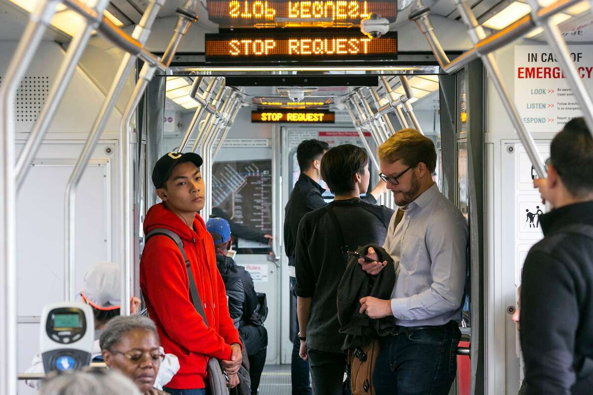 The Muni T line is known for the major issues that riders face including overcrowding, delays and the risk of car collisions because of left-hand turns. Riders take the light-rail on Wednesday, October 3, 2018 in San Francisco, Calif.