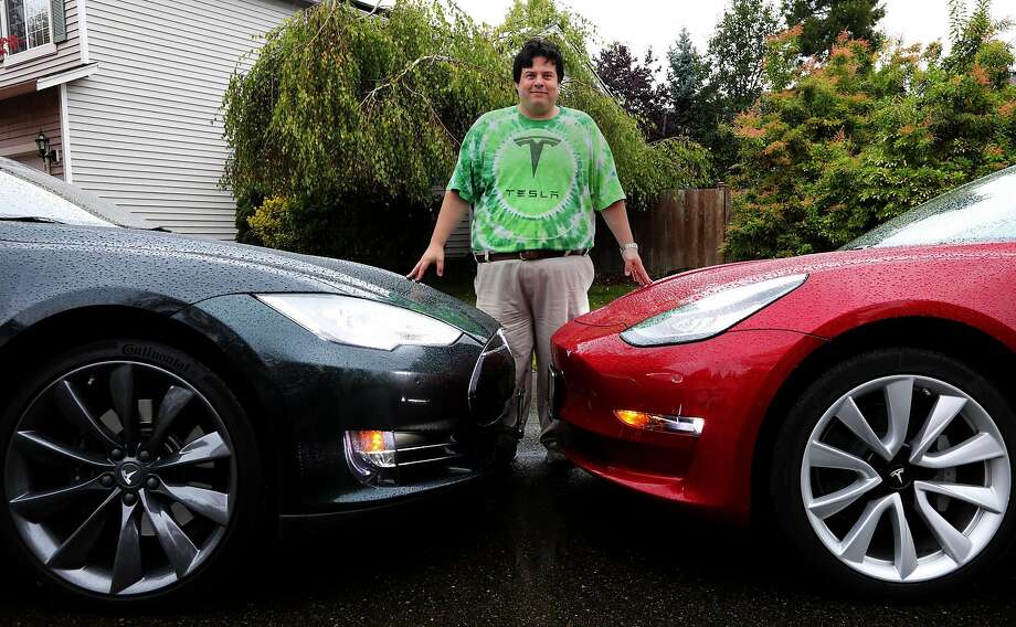 Matt Moreno of Washington State loves Tesla's electric vehicles. His family has two. Photo: Alan Berner / Seattle Times