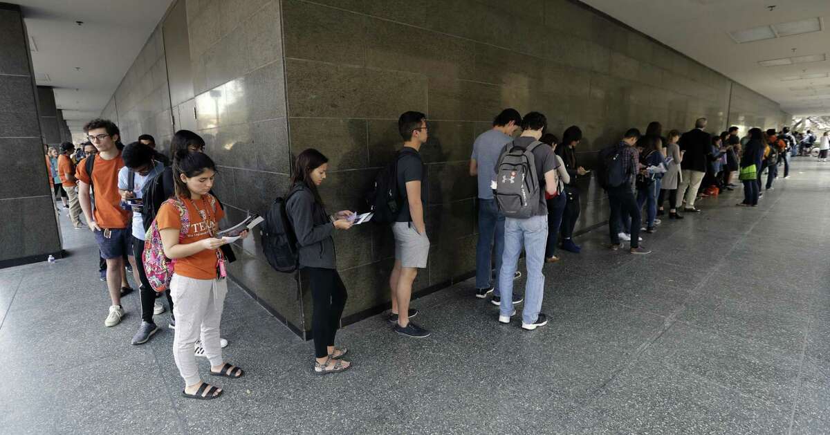 A line of mostly students wait to vote at a Texas primary election polling site on the University of Texas campus in Austin on March 6. Every vote counts, why everyone should vote.