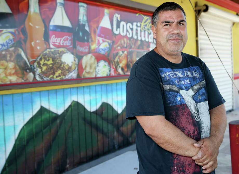 Mexican immigrant Sandro Alejandro Garcia Moreno stands by the grill area of what used to be Pollos Medina near Mission, Texas, Sunday, August 19, 2018. Garcia was a victim of wage theft when he worked at Pollos Medina starting in 2013. He and co-worker Jose Manuel Arciga Garcia sued and won a $108,000 settlement through the Fair Labor Standards Act in 2016. Photo: JERRY LARA, San Antonio Express-News / © 2018 San Antonio Express-News