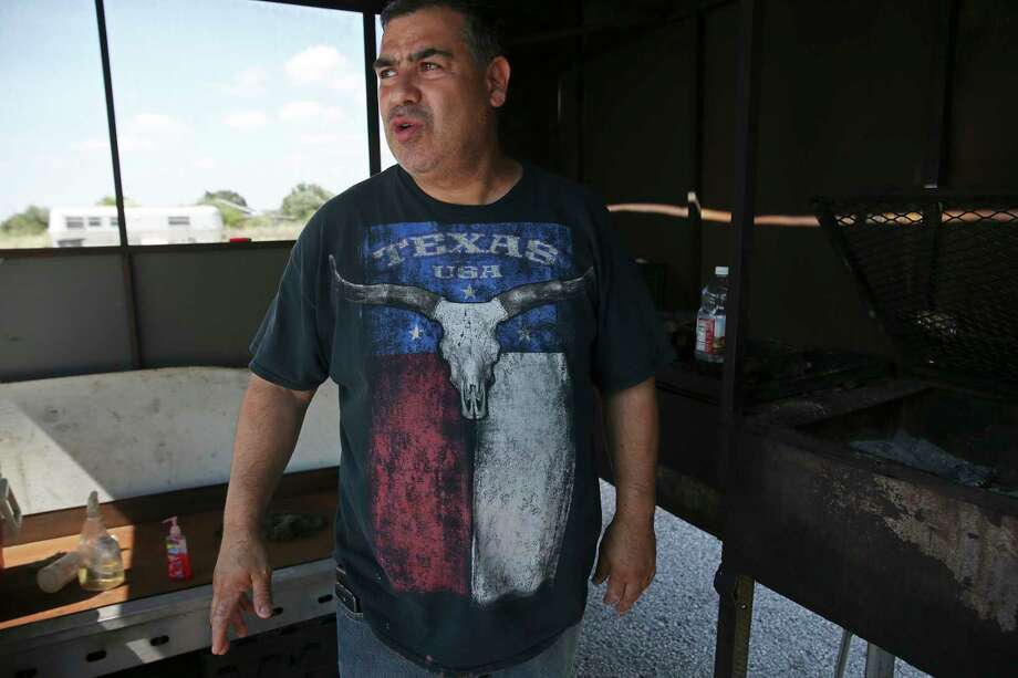 Sandro Alejandro Garcia Moreno talks about grilling chickens at a restaurant where he worked and lived in San Carlos, Texas, Sunday, August 19, 2018. Photo: JERRY LARA, San Antonio Express-News / © 2018 San Antonio Express-News