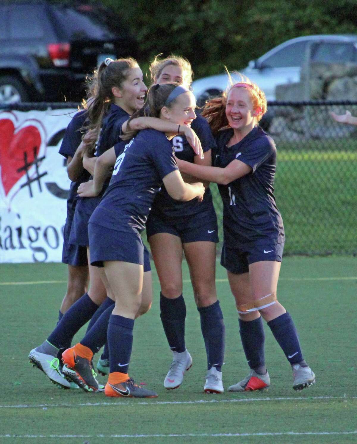 Staples players celebrate a second-half goal during an FCIAC girls soccer match between Darien and Staples on Friday, Oct. 12, 2018 in Westport, Conn. Staples defeated Darien 3-1.