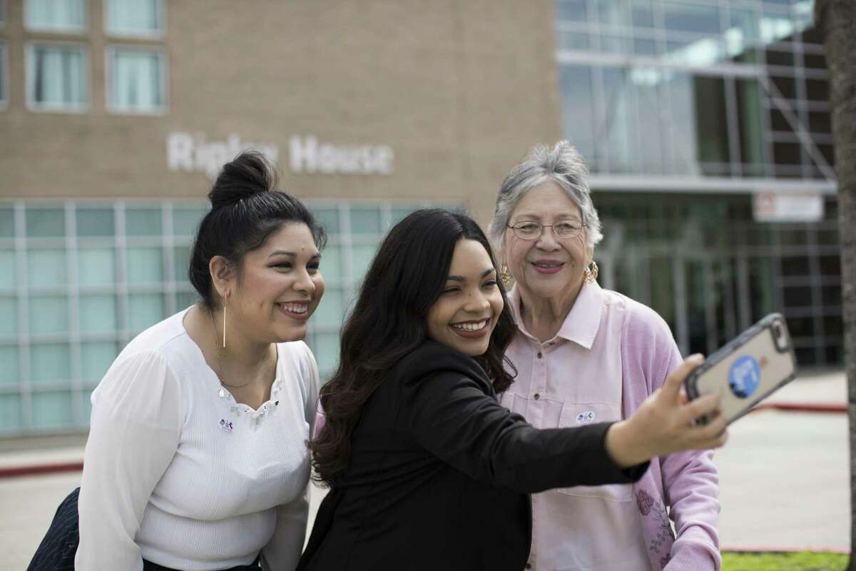 Didi Martinez, 28, Naiyolis Palomo, 24, and Marie Moreno, 77, pose for a selfie outside the Ripley House in Houston, Friday, March 2, 2018 after casting their votes early. ( Marie D. De Jesus / Houston Chronicle )