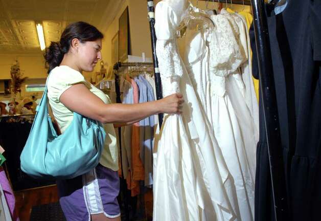 Evelyn Stowell of Riverside checks out wedding dresses on