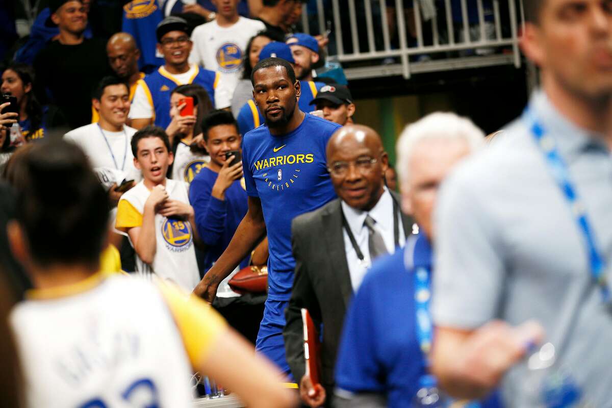 Golden State Warriors forward Kevin Durant (35) on the court for warm up before an NBA preseason game against the Los Angeles Lakers at SAP Center on Friday, Oct. 12, 2018, in San Jose, Calif.