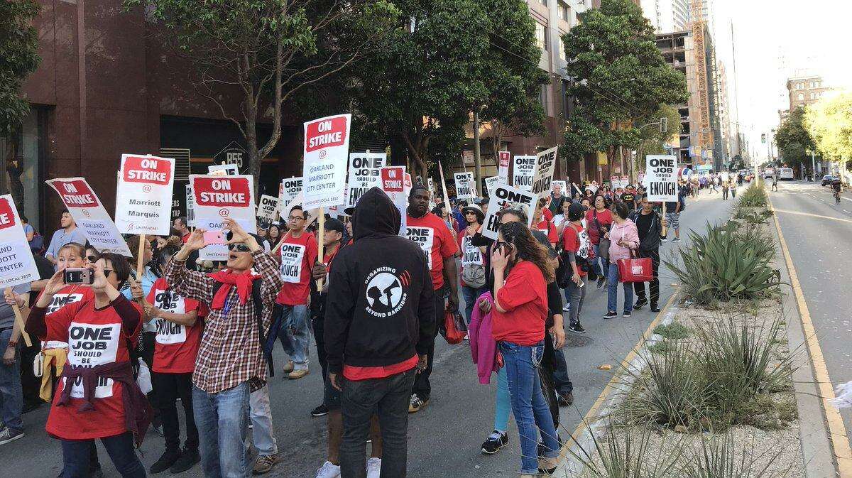 Strikers gather outside the Marriott hotel on Mission Street in San Francisco on Oct. 12, 2018.