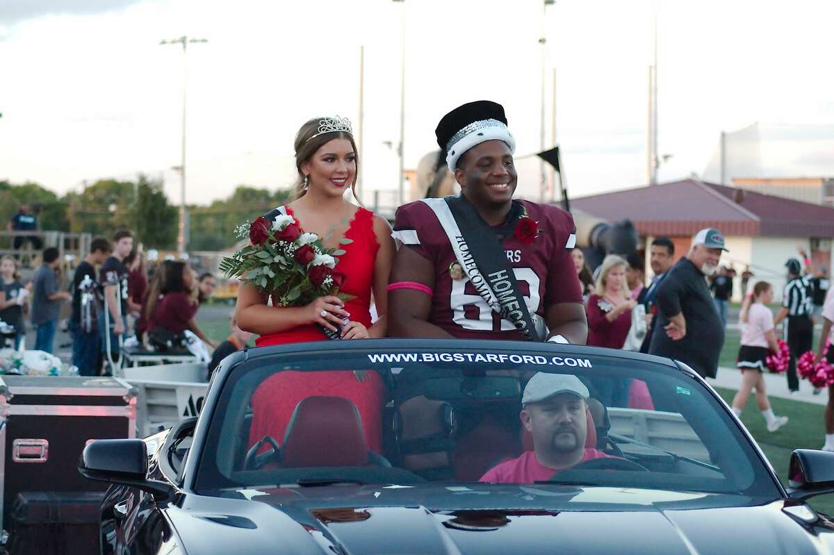 Maddie Dies and Sincere Haynesworth were crowned queen and king during the Pearland High School homecoming football game against Elsik at Pearland High School