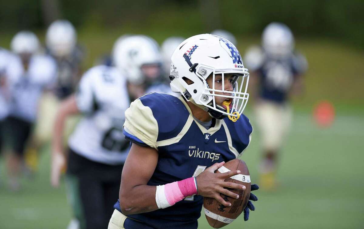 King's Justin Torres-West makes the game winning fourth quarter reception against Hamdem Hall in a football game at King School in Stamford, Conn., Saturday, Oct. 13, 2018.
