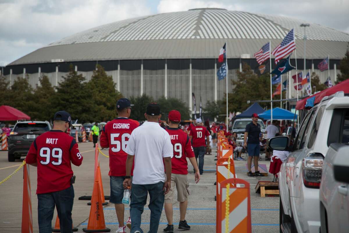 Fans tailgate prior to an NFL football game between the Houston