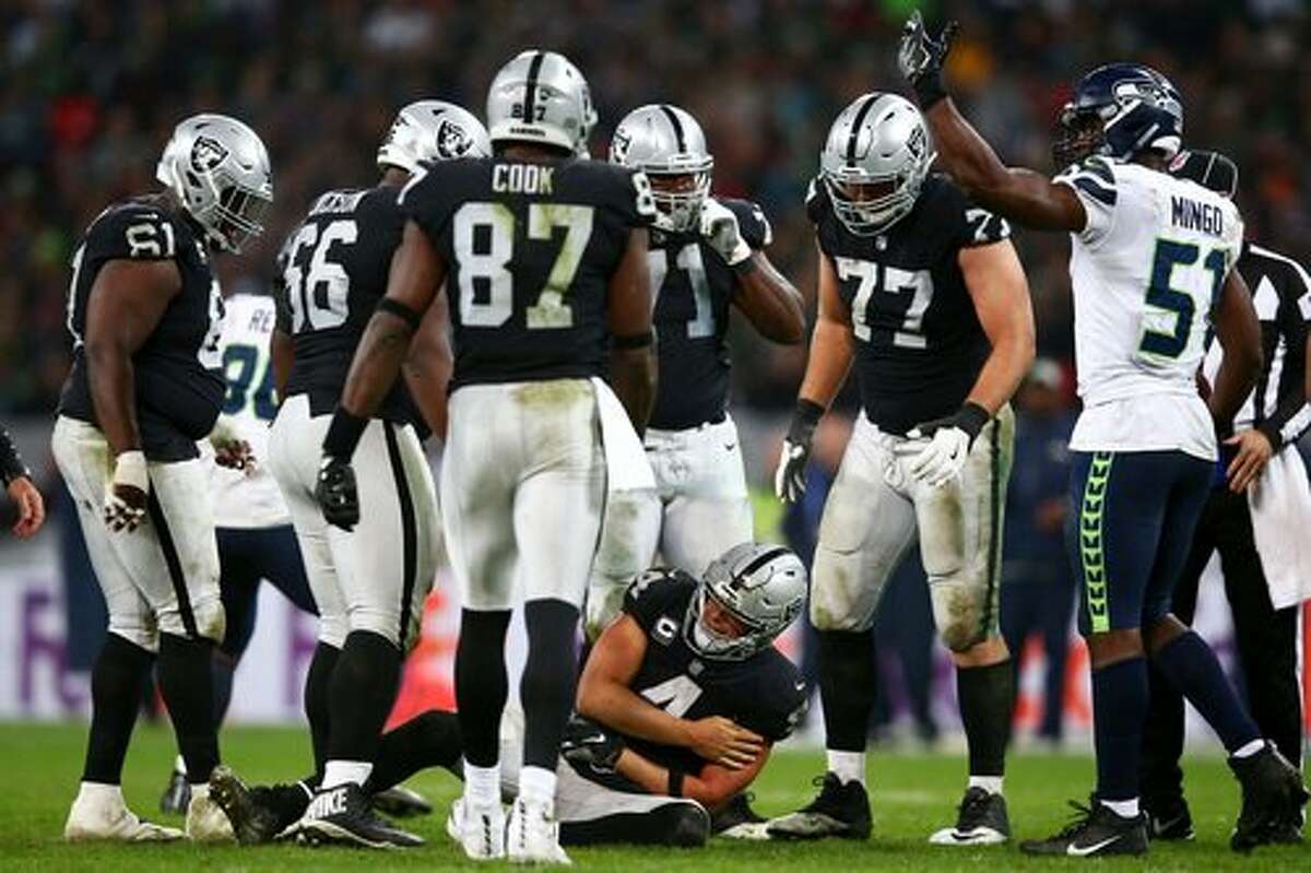 Did Oakland Raiders Players Punish Derek Carr for Standing During