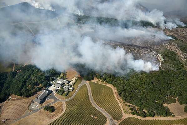 The Atlas fire burns near the Kenzo Estate winery in Napa, Calif., on Monday, October, 9, 2017.