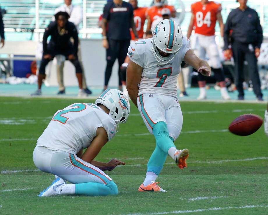 Miami Dolphins kicker Jason Sanders (7) scored the game-winning goal in overtime at an NFL football game against the Chicago Bears on Sunday, October 14, 2018, in Miami Gardens, Florida. The Dolphins beat the Bears 31 to 28. On the left, Matt Haack (2) marks the Miami Dolphins. (AP photo / Joel Auerbach) Photo: Joel Auerbach / FR17067388 AP