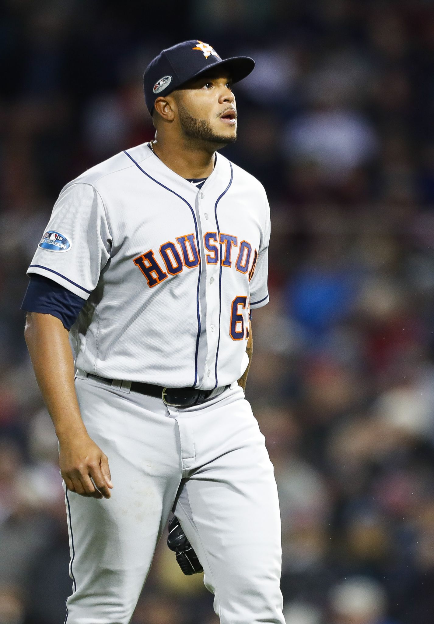 Houston Astros center fielder Jake Marisnick, left, fields a doubly by  Boston Red Sox's Mookie Betts as right fielder Josh Reddick (22) watches  during the fourth inning of a baseball game Friday