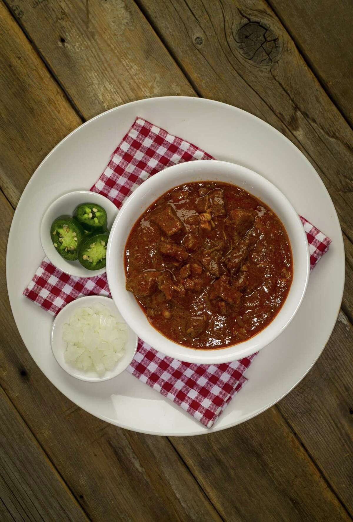 Chili Queen Chili: Recipe adapted from "The Chili Cookbook” by Robb Walsh. It’s made with diced beef chuck and pork shoulder simmered in a dried chile paste.