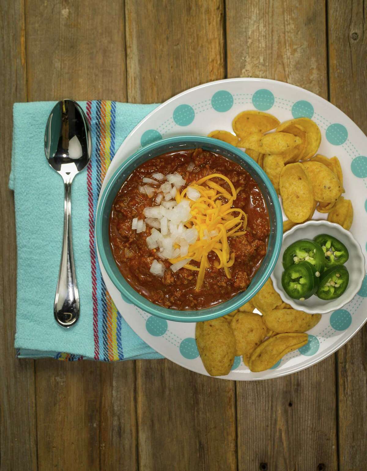 Texas Chile Con Carne adapted from a recipe by former food editor and cookbook author Dotty Griffith is made using coarsely ground sirloin and a dried chile paste.