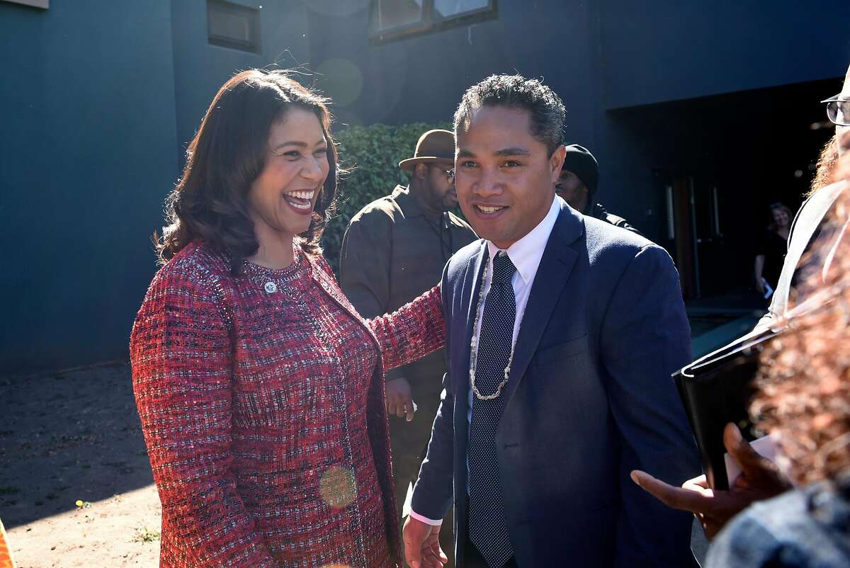 San Francisco Mayor London Breed, left, and Faauuga Moliga stand together following a ceremony swearing in Moliga as a new member of the San Francisco Board of Education, held at the June Jordan School for Equity in San Francisco, Calif., on Monday October 15th, 2018.