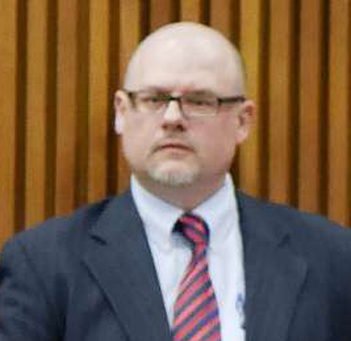 Rodney C. Powis, Sen. Simcha Felder's counsel and chief of staff, stands during the New York State Legislature joint budget hearing on Monday, Jan. 30, 2017, in Albany, N.Y. A female lobbyist has accused Powis of groping and sexually harassing her at a campaign fundraiser last week. (Paul Buckowski/Times Union archive)