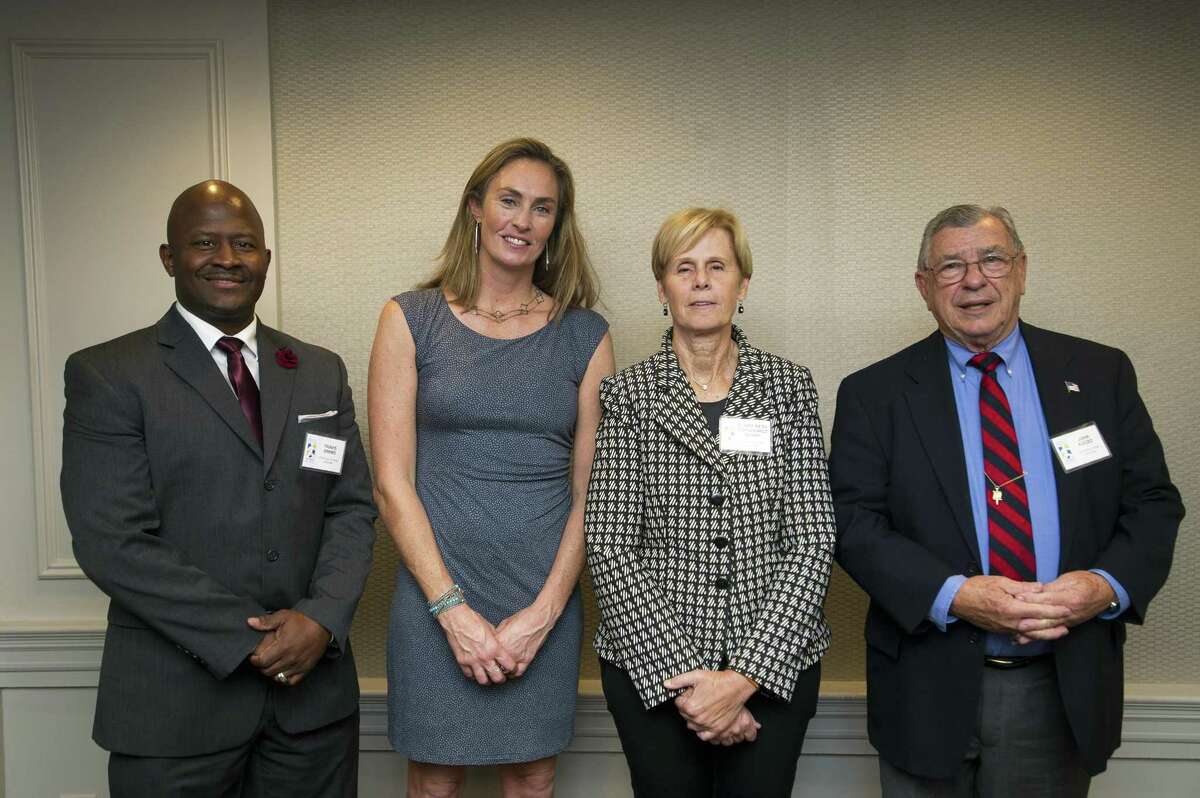 2018 Connecticut Sports Hall of Fame inductees, from left, Travis Simms of Norwalk, A.J. Mleczko Griswold of New Canaan, Claire Beth Tomasiewicz Nogay of Weston and John Kuczo of Stamford pose for a photo during the Fairfield County Sports Commision's Sports Night at the Stamford Marriott in downtown Stamford, Conn. on Monday, Oct. 15, 2018.