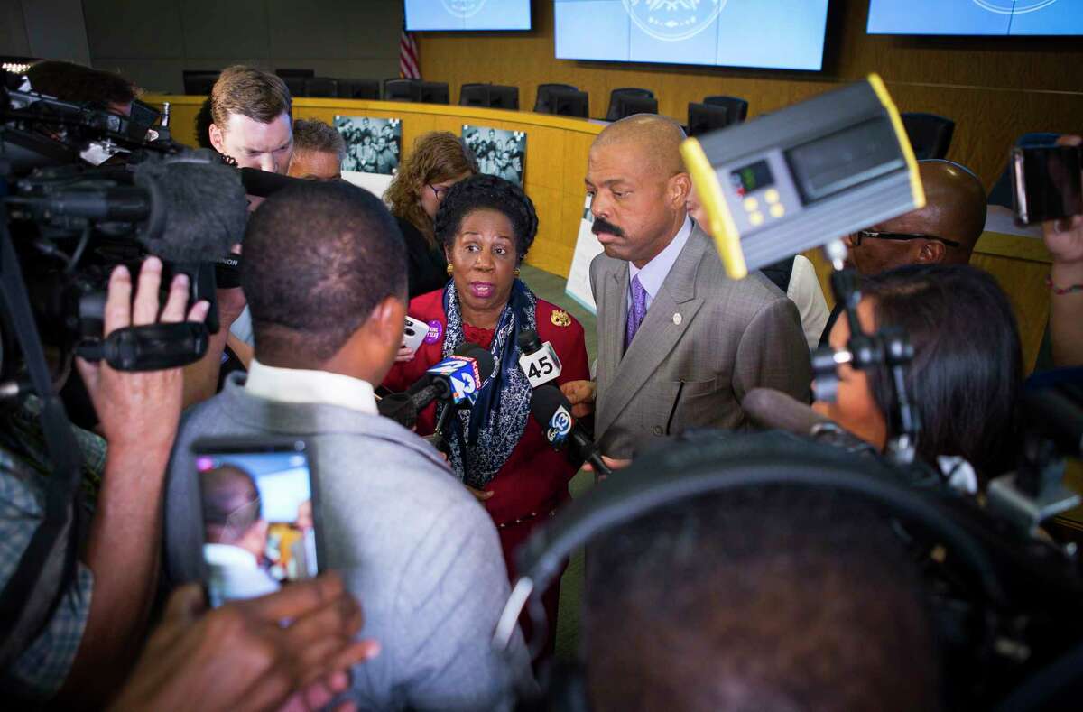 Congresswoman Sheila Jackson Lee and state Sen. Borris Miles talk to the media following a press conference at the Hattie Mae White Educational Support Center, Monday, Oct. 15, 2018 in Houston. Trustees apologized for the recent turmoil among the school board and stated that Lathan would continue to serve as the interim superintendent.