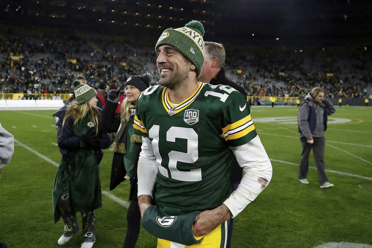 Green Bay Packers quarterback Aaron Rodgers (12) walks off the field after an NFL football game against the San Francisco 49ers Monday, Oct. 15, 2018, in Green Bay, Wis. The Packers won 33-30. (AP Photo/Matt Ludtke)