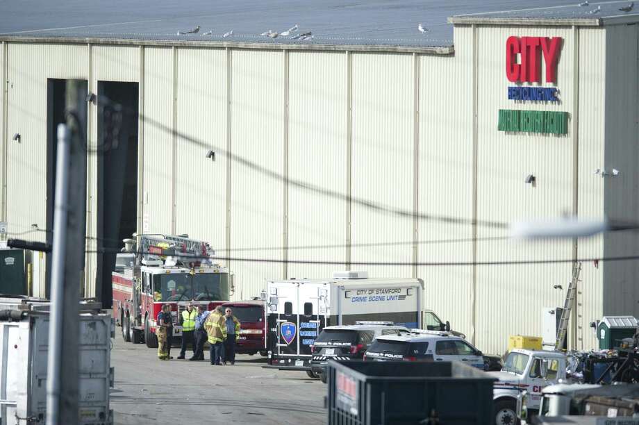 Emergency personnel respond to a report of a dead baby in a dumpster at the City Carting & Recycling on Taylor Reed Pl. in Stamford. Photo: Michael Cummo / Hearst Connecticut Media / Stamford Advocate