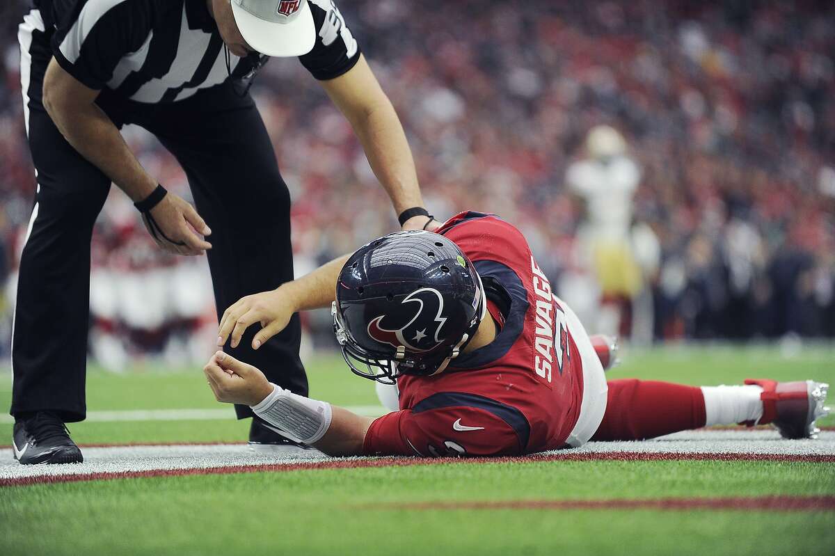 FILE - In this Sunday, Dec. 10, 2017, file photo, Houston Texans quarterback Tom Savage (3) is checked by a referee after he was hit during the first half of an NFL football game against the San Francisco 49ers, in Houston. Savage left the game and it was later determined he had a concussion. On Friday, Dec. 29, 2017, the NFL announced a series of changes to the way possible concussions are handled during games following the incident in which Savage was allowed to return to the field after a hit left him on the ground, arms shaking. (AP Photo/Eric Christian Smith, File)