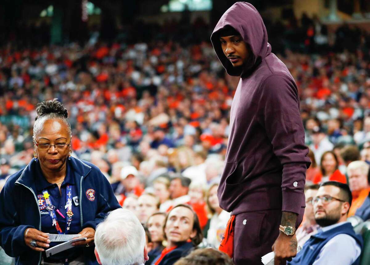 PHOTOS: A look at the celebrities at the Astros game, as well as other fans Houston Rockets player Carmelo Anthony finds his seat during Game 3 of the American League Championship Series at Minute Maid Park on Tuesday, Oct. 16, 2018, in Houston. Browse through the photos above for a look at the Rockets stars and celebrities, as well as other Astros fans at Tuesday's game ...