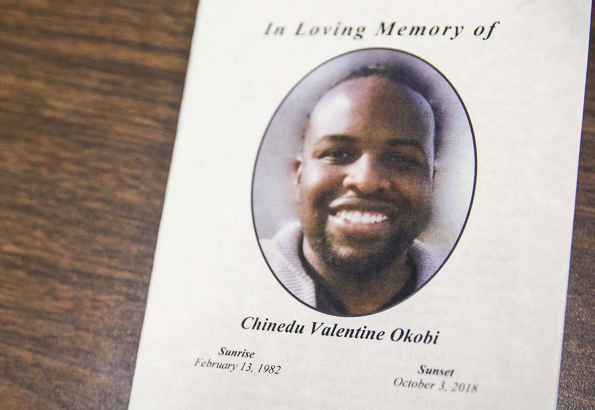 A pamphlet sits on a table during a press conference held by Attorney John Burris calling for an investigation into the death of Chinedu Okobi at the hands of San Mateo County sheriff's deputies following a memorial service for Okobi held at San Francisco Christian Center in San Francisco, Calif. Tuesday, Oct. 16, 2018.