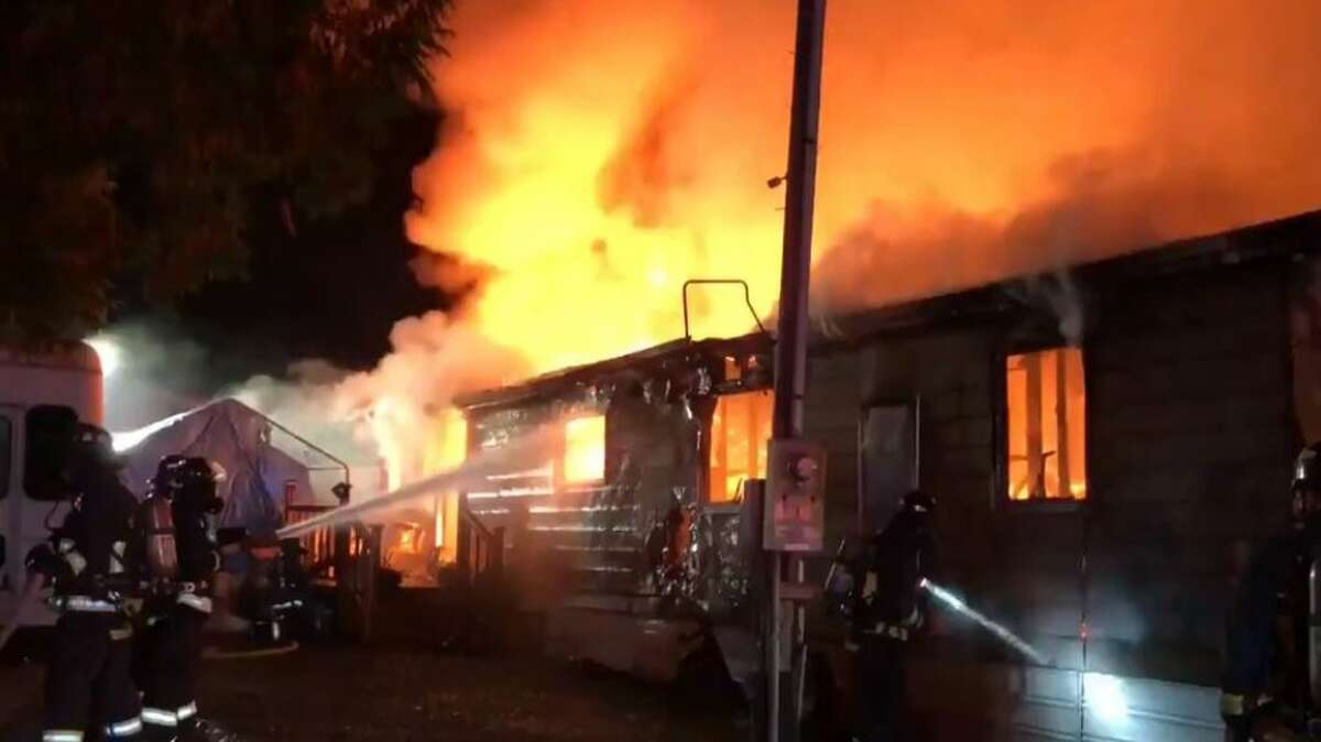 Photos from the scene show flames shooting off of the mobile home.