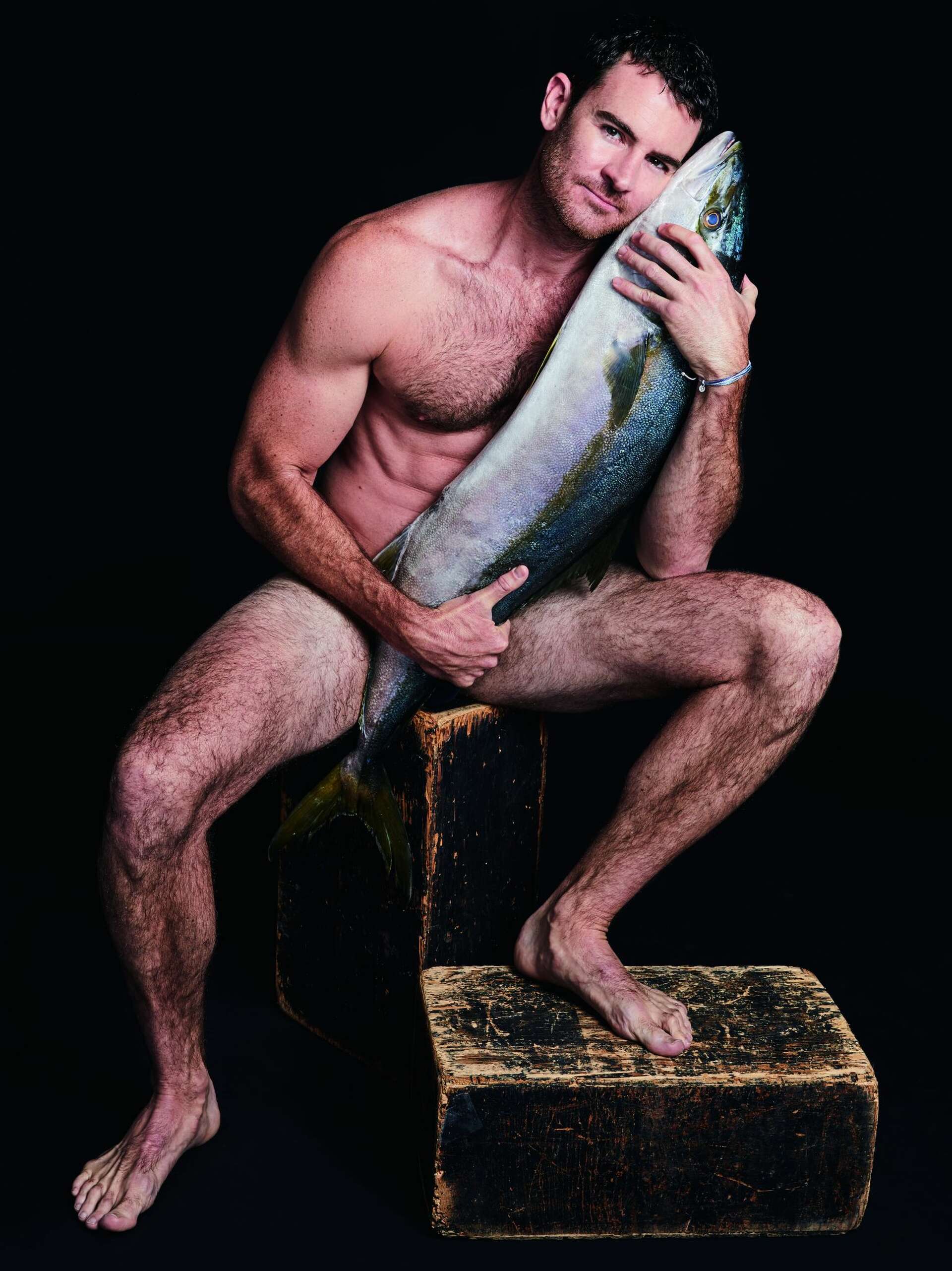 Naked celebrities fondle these dead fish in an effort to save them