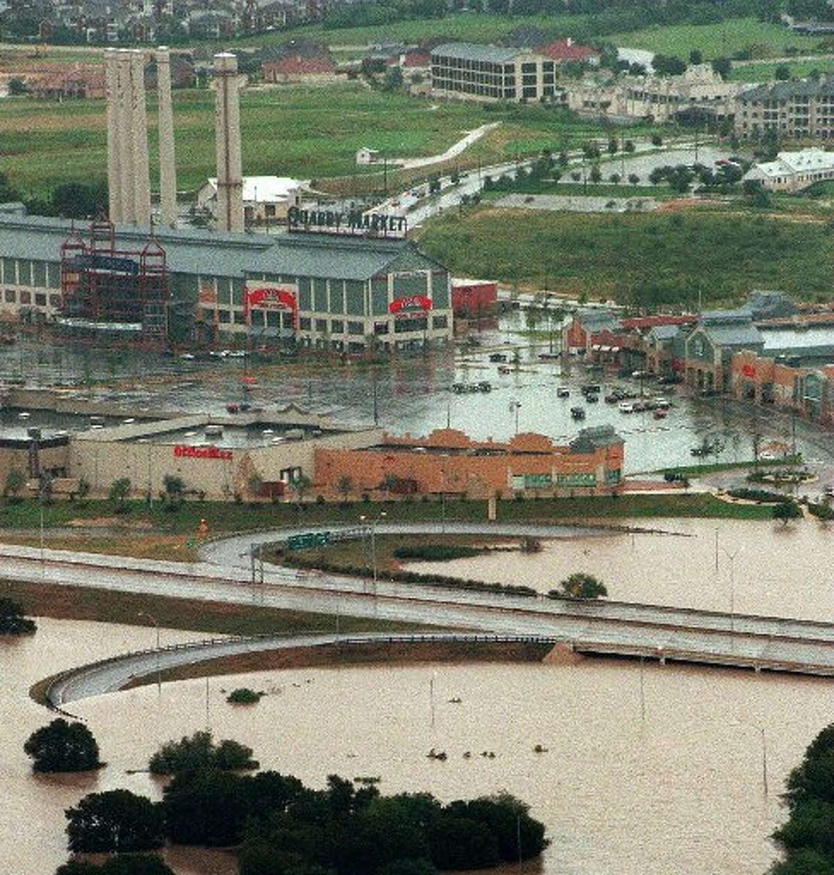 The intersection of Basse Road and Highway 281 is flooded in San Antonio, after storms closed several highways in the area Sunday, Oct. 18, 1998. Drenching storms swept through Texas killing twenty-nine people.