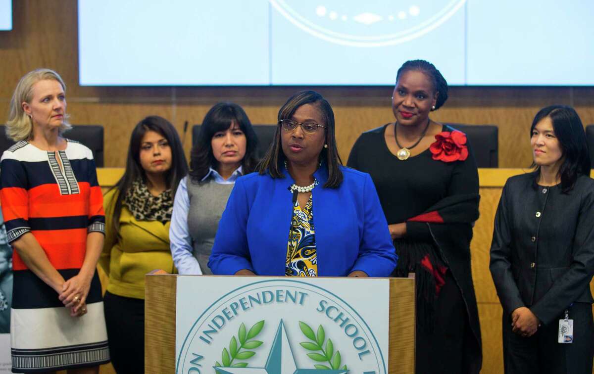 In this 2018 file photo, Houston ISD Interim Superintendent Grenita Lathan addresses reporters while backed by members of the district’s school board. The Legislative Budget Board issued a 325-page performance review Friday that included dozens of recommendations for improving the district’s operations.