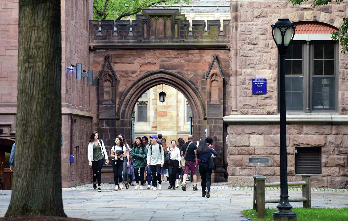 Students walk into Yale University’s Old Campus in New Haven Oct. 2.