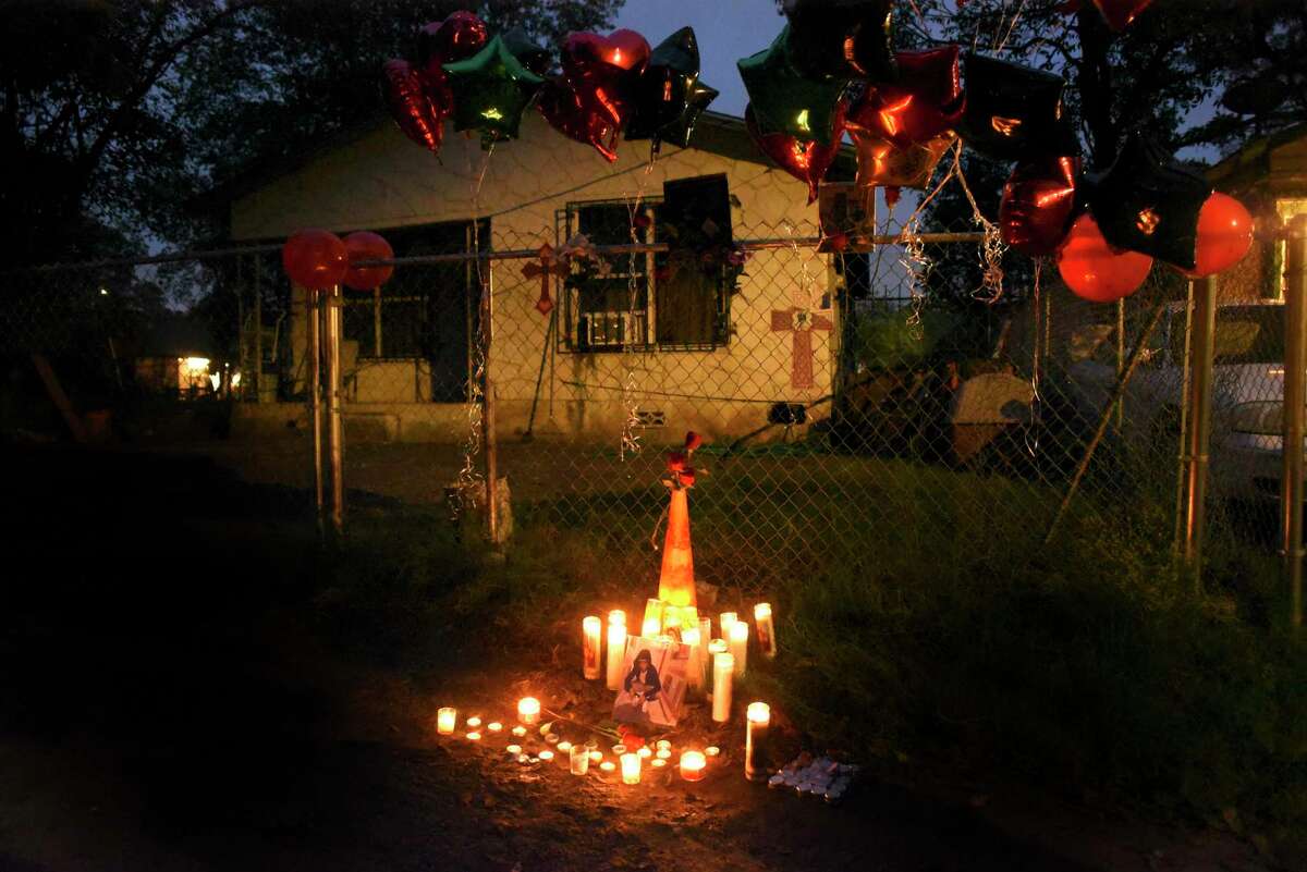 A makeshift memorial to Charles Roundtree Jr., an 18-year-old who was shot and killed by police, is seen in the 200 block of Roberts Street in October.