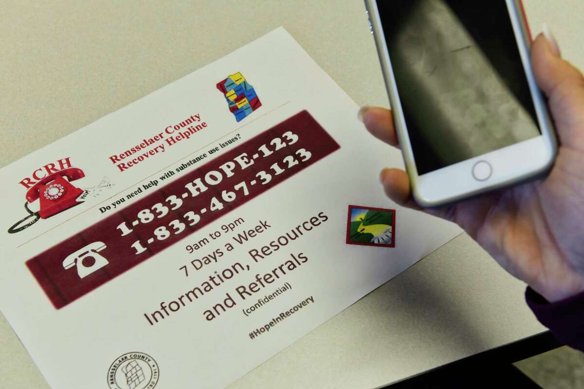 A view of a flier for the new Rensselaer County Recovery Helpline, seen at the Rensselaer County Office Building on Thursday, Oct. 18, 2018, in Troy, N.Y. Residents can call the helpline at 1-833-HOPE-123 to receive information, resources or referrals for themselves or anyone needing help with substance abuse and recovery. (Paul Buckowski/Times Union)