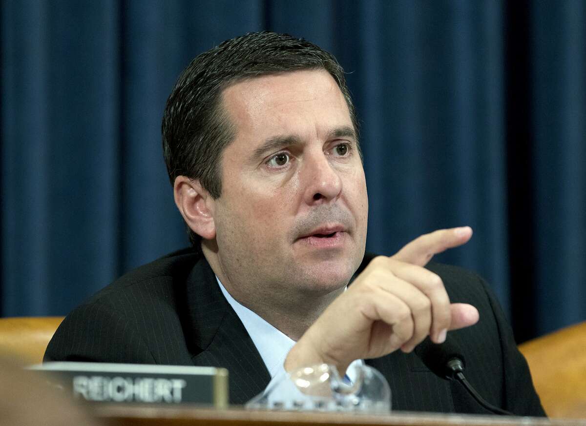 FILE - In this Wednesday, March 21, 2018, file photo, Rep. Devin Nunes, R-Calif,. is seen during the hearing on trade policy before the House Ways and Means Committee on Capitol Hill in Washington. Nunes is being criticized by his rival in the November election after a photo on social media showed Nunes next to a supporter making a hand gesture that some consider racist. Nunes' campaign did not immediately respond for a request for comment. (AP Photo/Jose Luis Magana, File)