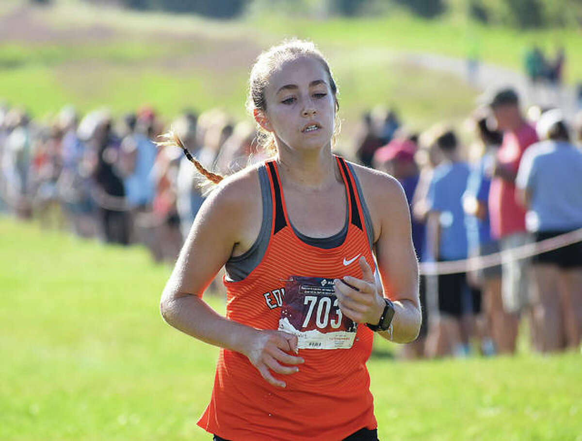 Edwardsville’s Hannah Stuart is on her way to a fourth-place finish in the Edwardsville Invitational on Sept. 15 at SIUE.