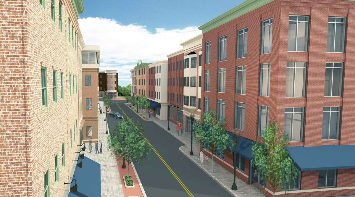 A rendering shows plans for Factory Street in Derby, facing South West. The Planning and Zoning Commission cleared the way for the development in downtown Derby by turning Factory Street into a Planned Development District which will allow Derby Downtown, LLC to propose their $400 million project next month. The plan includes four story buildings totaling 400 apartments on the upper floors and retail on the first floor.